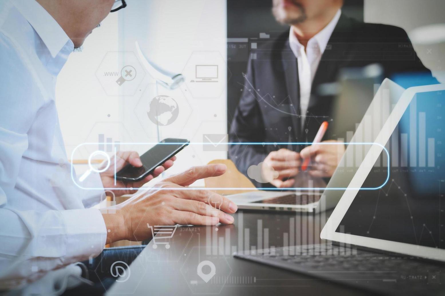 Professional using keyword research tools on computer